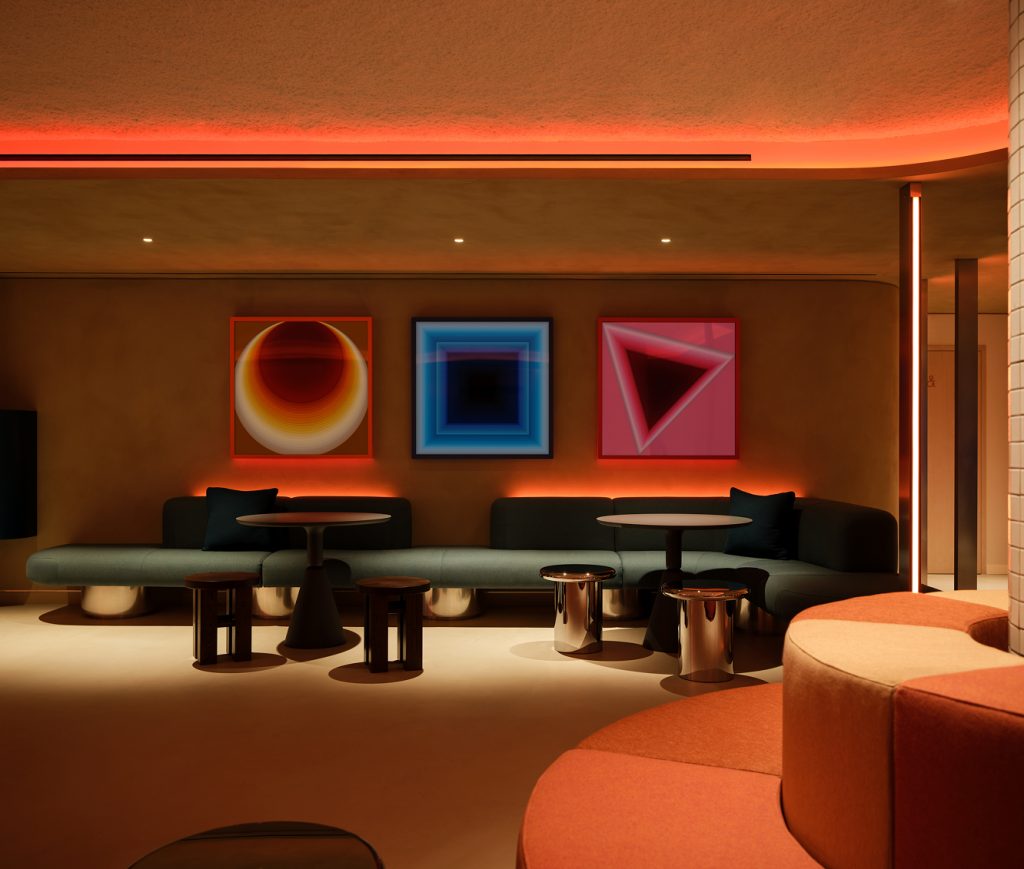 The Huddle common area with seating at Otherwander Soho Pod Hotel